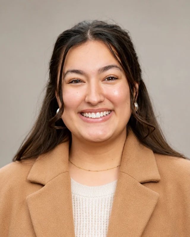 Portrait of Davi L. Kaplan-Gomez, smiling