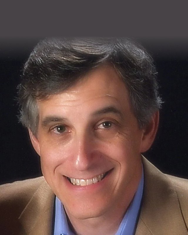 Portrait of David Fellows, smiling