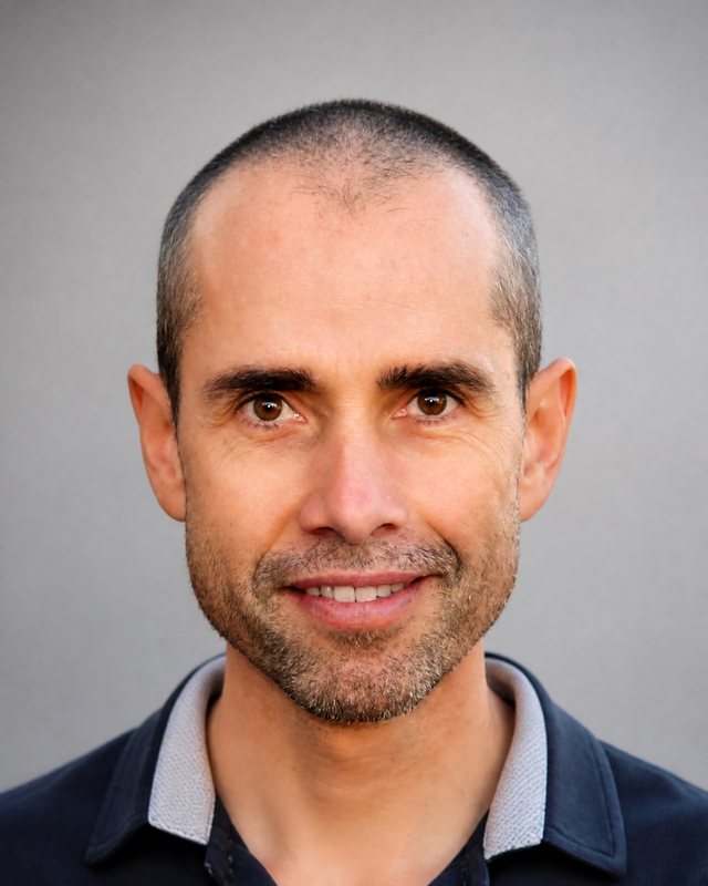 Portrait of Jesse Gamueda, smiling
